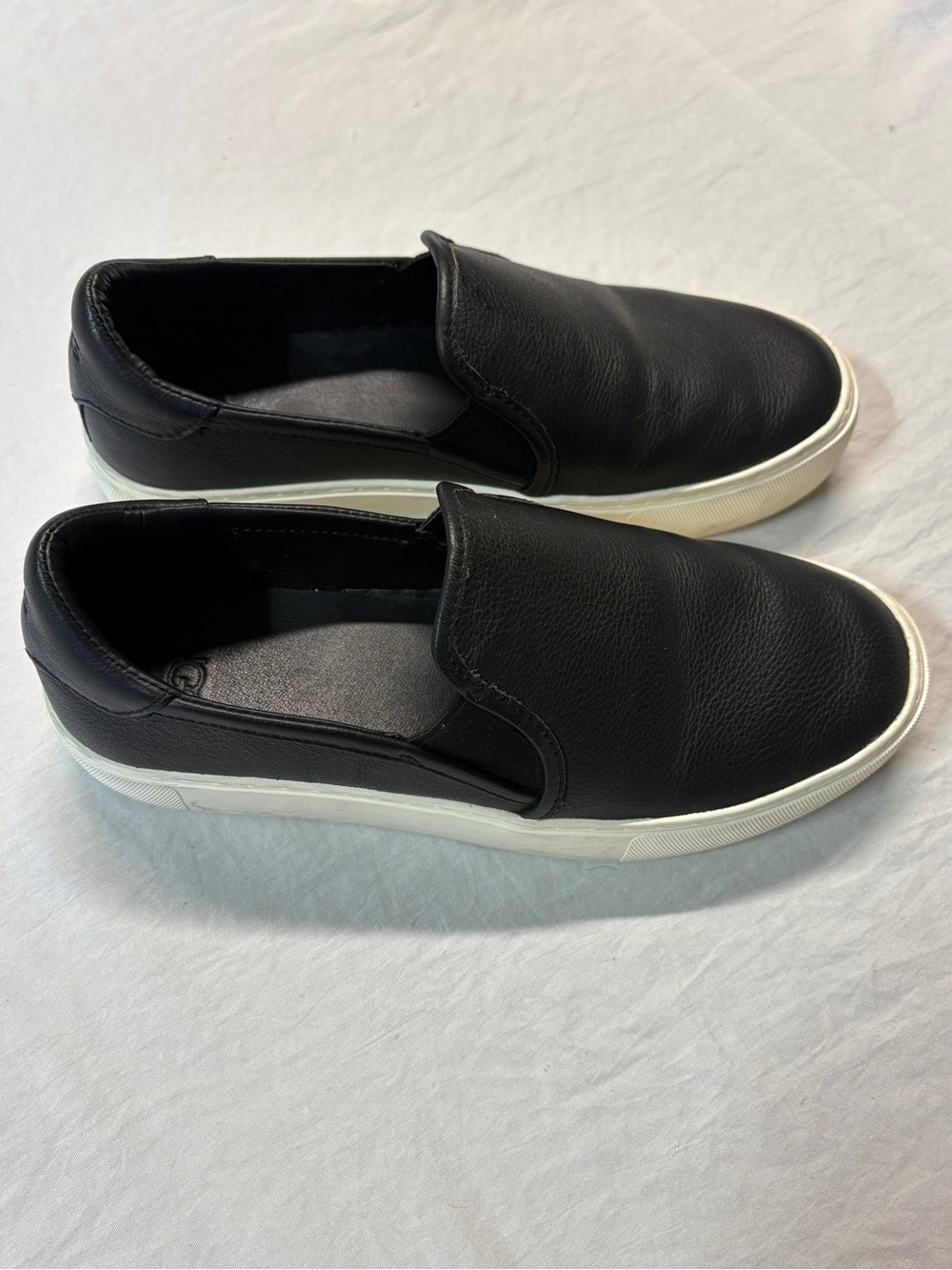 UGG Black Slip-On Leather Sneakers